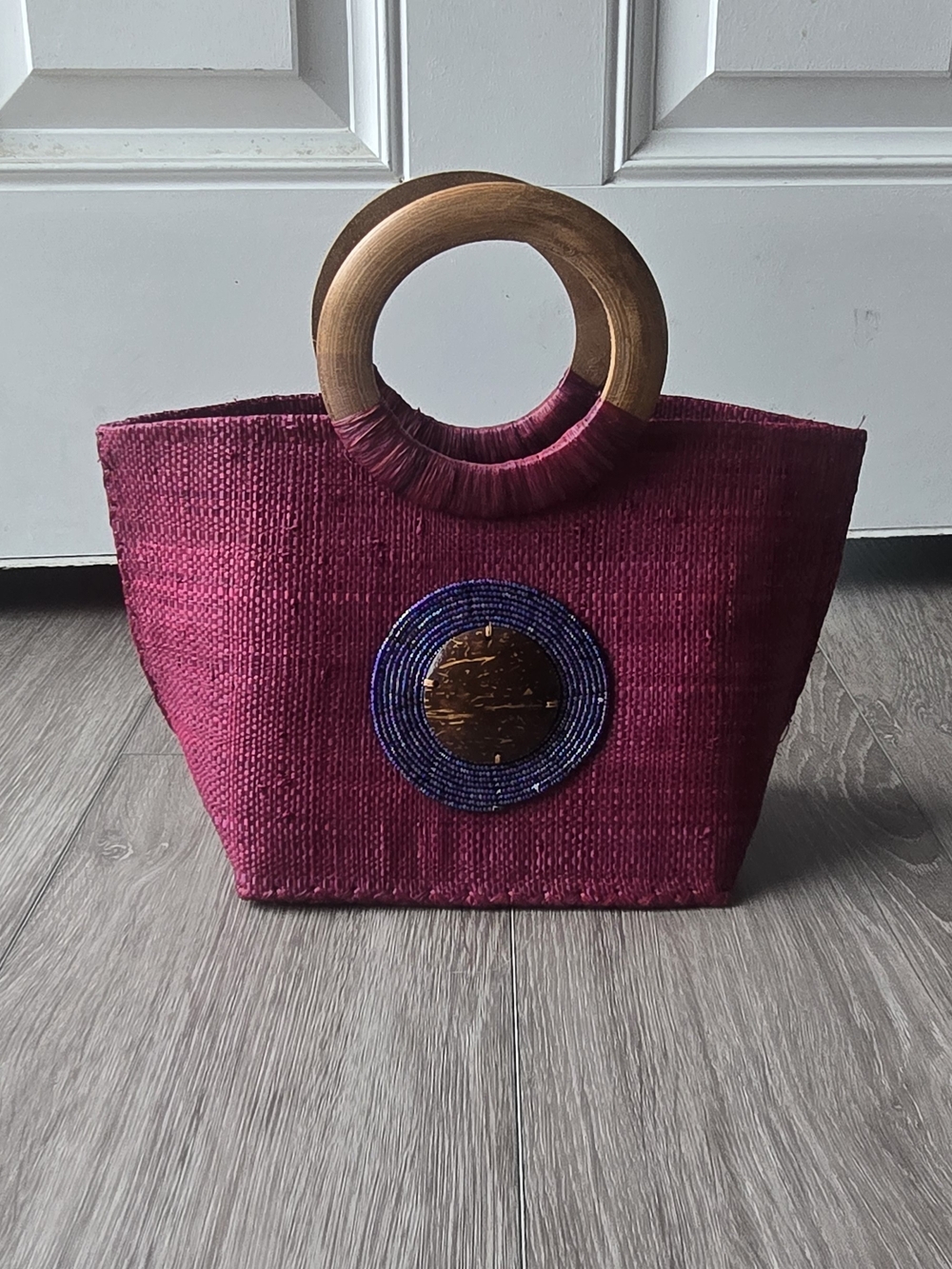 Artisan Raffia Tote Bag Wood Ring Handle Beaded Coconut Shell Medallion Fuchsia